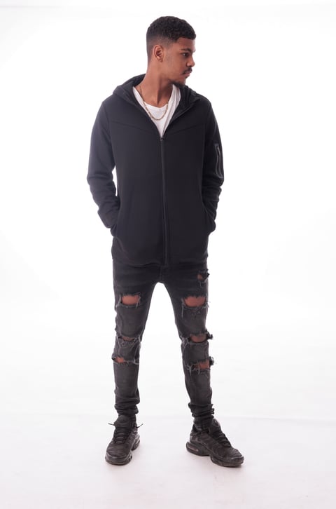 Man in black hoody streetwear