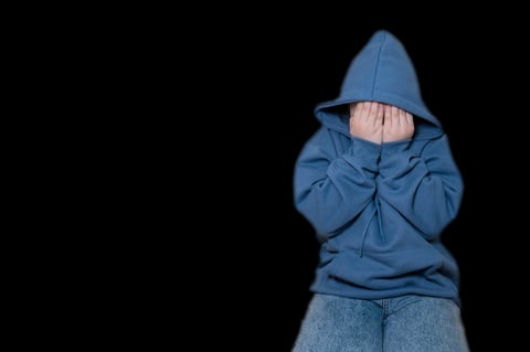 Man in blue hoodie streetwear